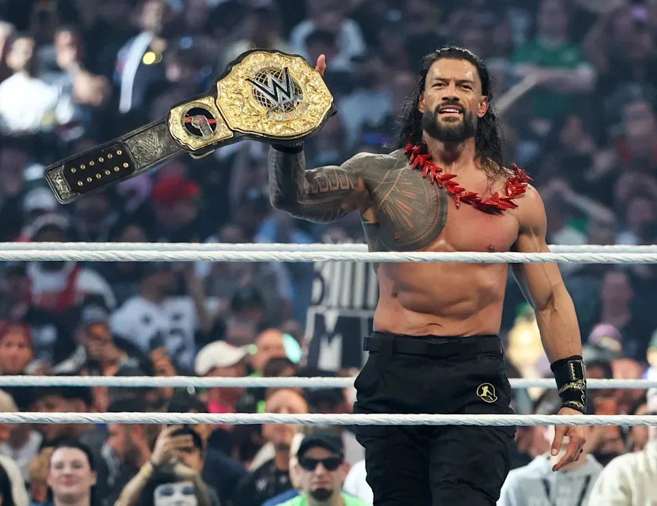 Roman Reigns celebrates after defeating CM Punk to win the World Heavyweight Championship match during WrestleMania 42 at Allegiant Stadium on April 19, 2026 in Las Vegas, Nevada.