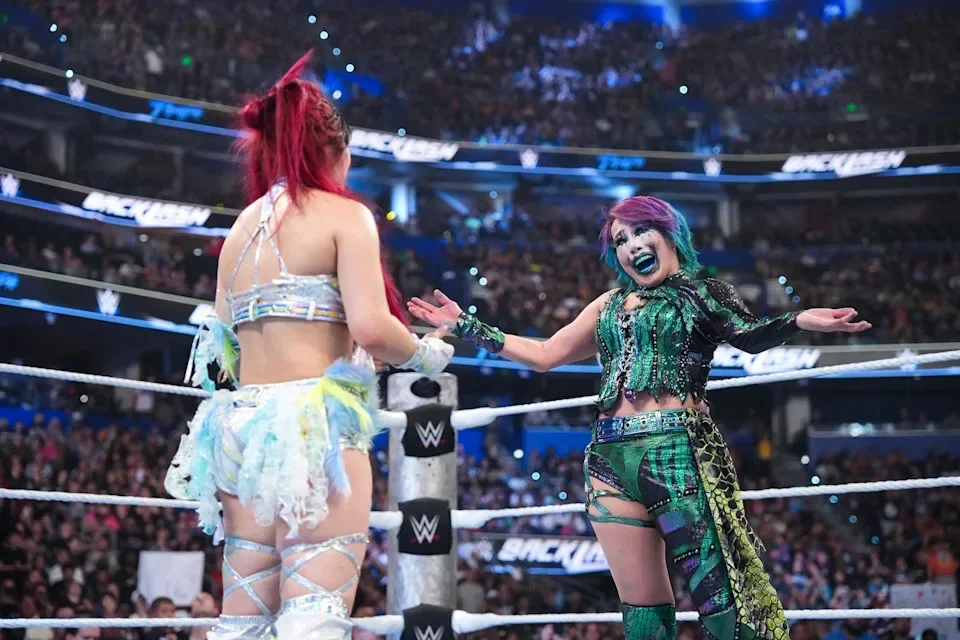 TAMPA, FLORIDA - MAY 9: IYO SKY and Asuka embrace during WWE Backlash at Benchmark International Arena on May 9, 2026 in Tampa, Florida. (Photo by Michael Owens/WWE via Getty Images)